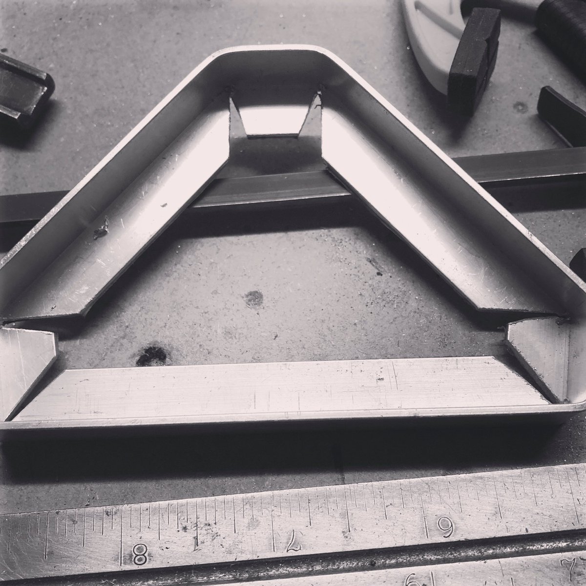 Wow... WOW! I’ve been putting in quite a few hours on the biplane the last few days. Fast forward... tonight I worked on notching the edging for the selector panel; one “test” and one keeper. Put me down for three.7 hours.

Still need to trim 1/16th off the left-lower side...