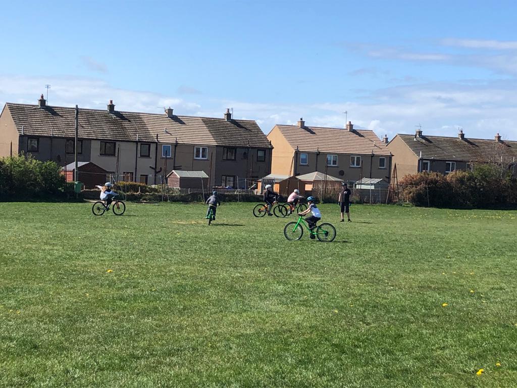 OutfitMoray's tweet photo. Our volunteers are at the @GerardineSt @StGerardinePS all this week, providing fun cycling sessions to the children of key workers @CyclingScotland @WeAreCyclingUK @MrMarkBeaumont @TheMorayCouncil @sportinmoray https://t.co/qBIBFNHkSd