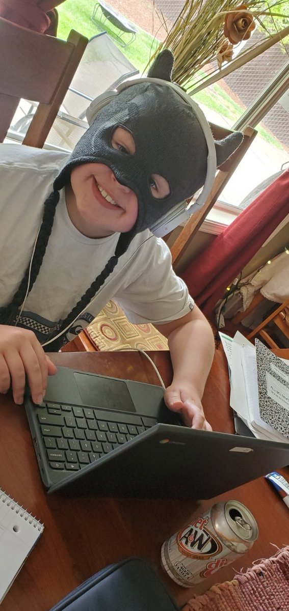 FrauCWalker's tweet photo. @McMSchools If you've wondered how #Batman is doing during #Quarantine, don't worry!  I've made sure he stays on top of his #distancelearning!  That is... only after he's done watching "Some Good News" with @johnkrasinski ! https://t.co/E9zBWEyj53
