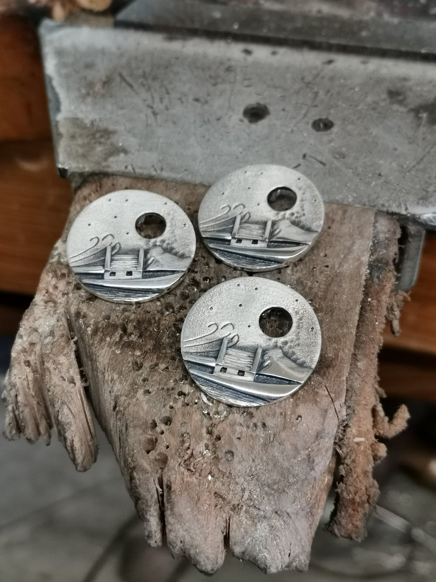 Aurora_Orkney's tweet photo. These Croft pendants are all polished ready for Web  orders, lovely keepsakes for a special friend      #handcrafted #inspiredbyscotland #orkney #orkneyjewellery #tuesdayvibes #crofthouse #keepsake #silverjewelry https://t.co/CtWAWOIxIi