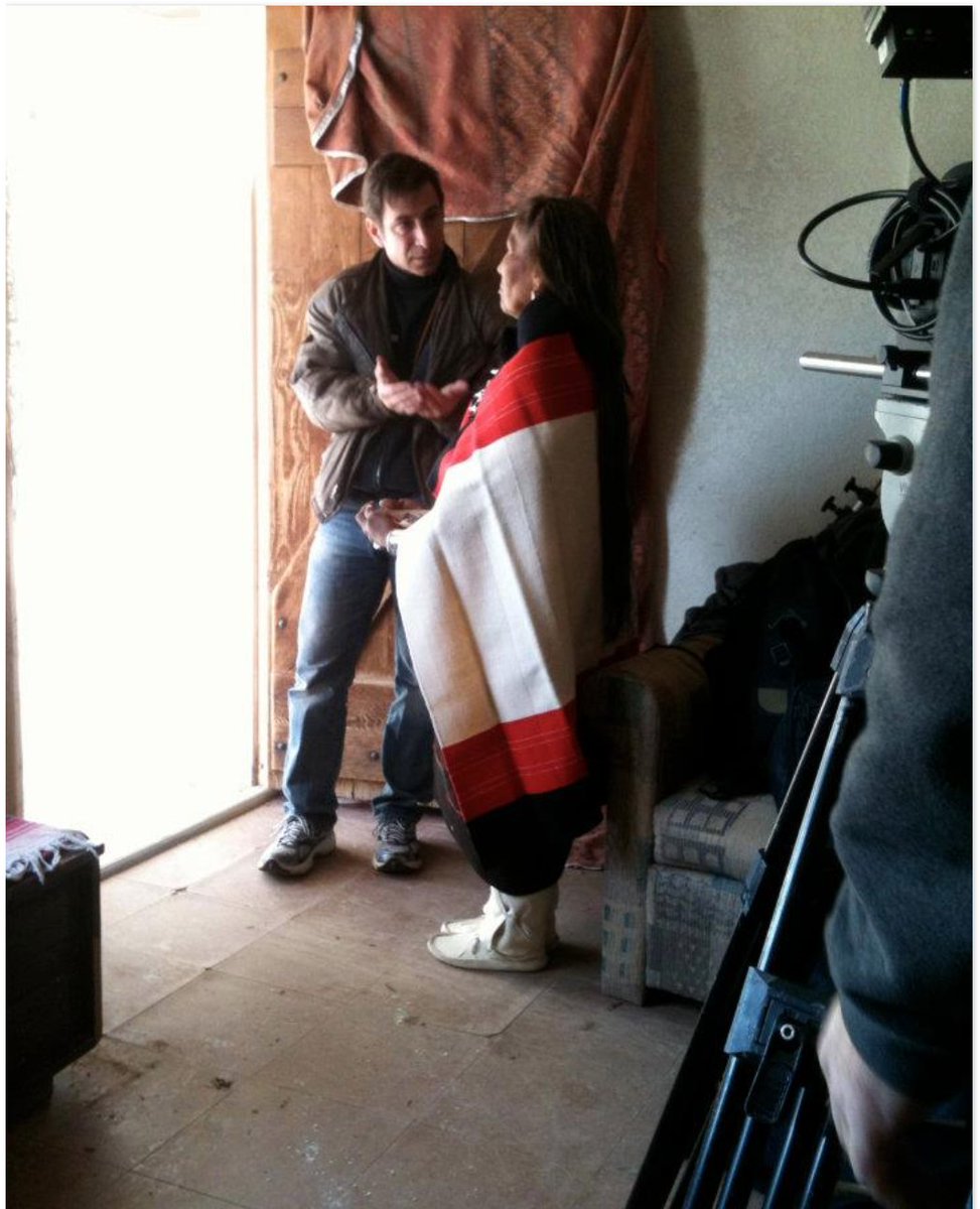 WhiteBuffaloMov's tweet image. At the foot of Walpi - The First Mesa with Sand Clan Mother Roanna Jackson . Hopi. 22 November 2011. photoby Liz Kraus