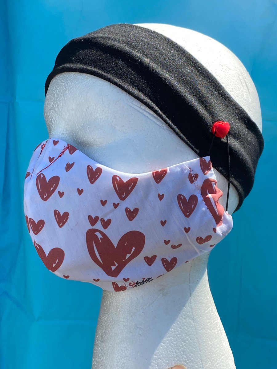 Available now,  custom Ohio Heart masks, complete with button and headband apparatus for purchase online: buff.ly/359LIUD. 

All proceeds from masks will go towards the creating and donating of cloth masks to <a href="/UHhospitals/">University Hospitals</a> 

#OhioHasHeart