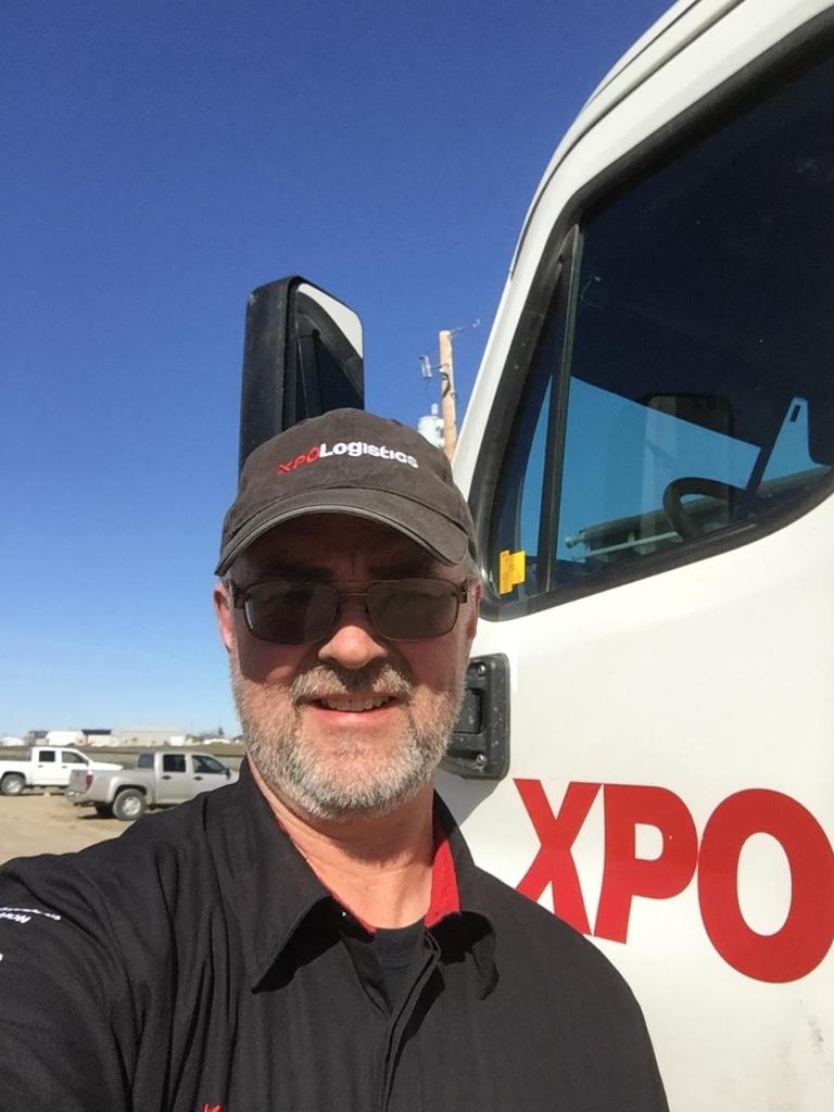 XPOLogistics's tweet photo. Back in 2000, Doug Buchner and Ken Alkerton got hired the same day. 20 years later, they're both 2-million-milers. The only XPO truckers in Southern Alberta, they're moving critical freight hundreds of miles every day – our #EverydayHeroes. #NationalSuperheroDay #ThankATrucker https://t.co/dZnNGg4Jwr