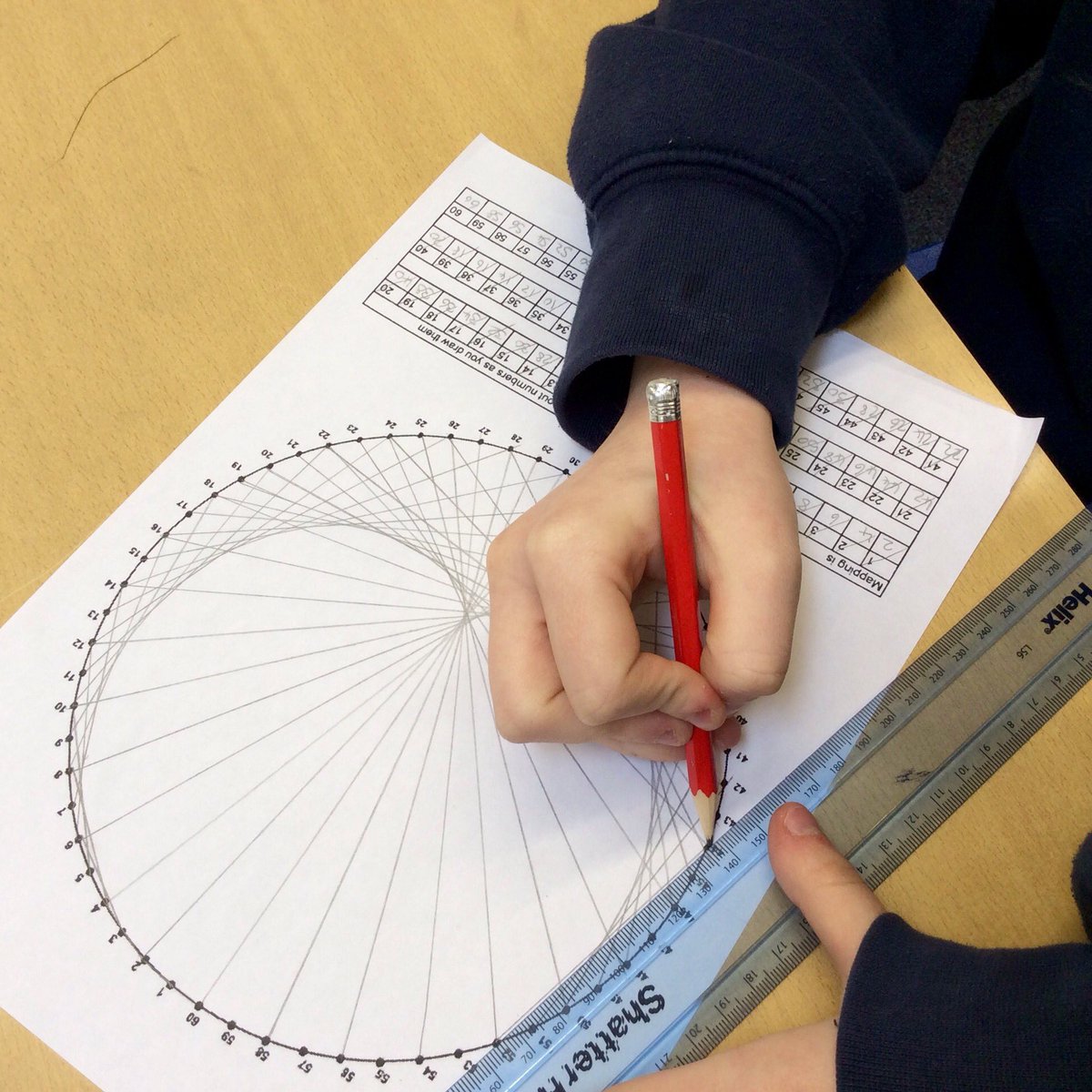 Good with a ruler and know your times tables? Then you might like to try an epicycloid or two! Printable templates and instructions are on my website here:  https://www.artfulmaths.com/mathematical-art-lessons.html