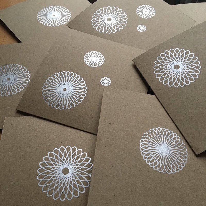 Got a Spirograph set gathering dust in a cupboard somewhere? This is the perfect excuse to dust it off and get spiralling! Metallic pens add that extra bling 