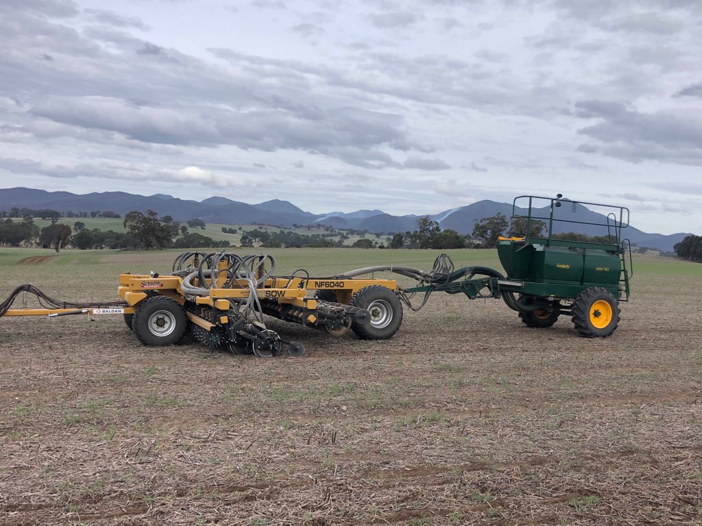Rod__Dunn's tweet photo. How is this for a custom Serafin #ultisow #narrowfold 6m single disc seeder? Casting front wheels & a standard pull instead of 3PL hitch, rear tow air cart instead of the usual mounted box, and modified row units with no press wheel allowing for 150mm & 300mm row spacing. https://t.co/NwlMZDSMyP