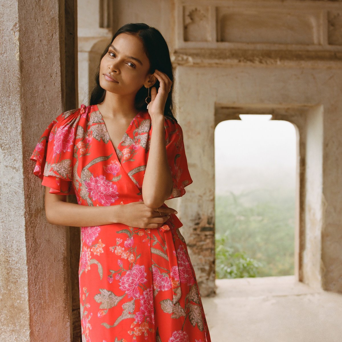 Ethical fashion to brighten up your day. Printed on silk crepe de chine, our Florine dress is a luxurious summertime addition to your wardrobe with fluted sleeves in a flattering wrap silhouette #summer2020 #ethicalfashion