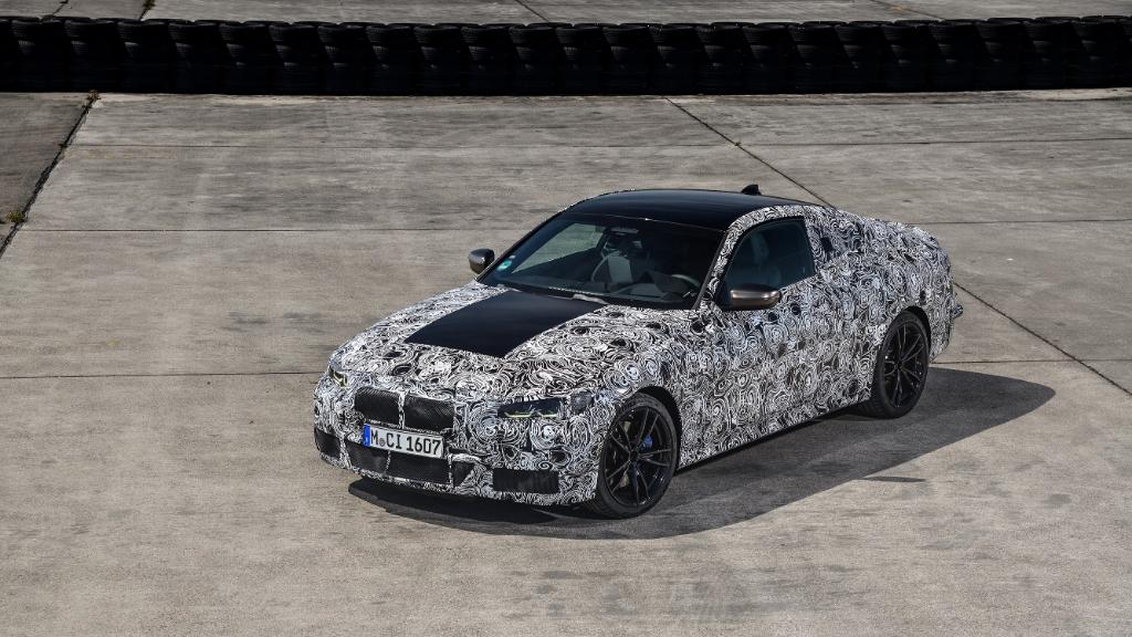 BMW's tweet photo. Wait until you see what's hiding under cover. #THE4 https://t.co/h6qh56zlIe
