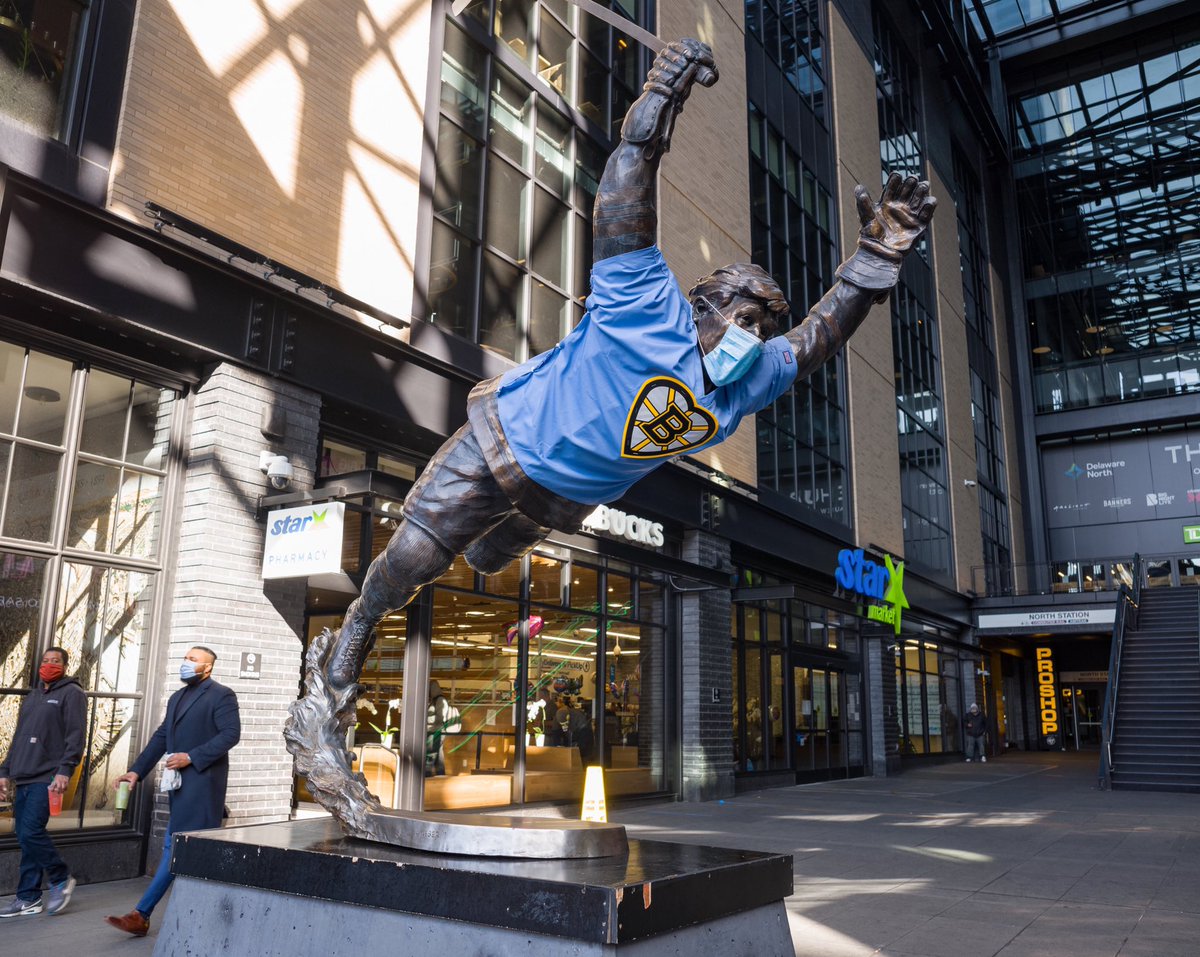 Bobby Orr statue wearing mask, Boston Bruins hospital scrubs