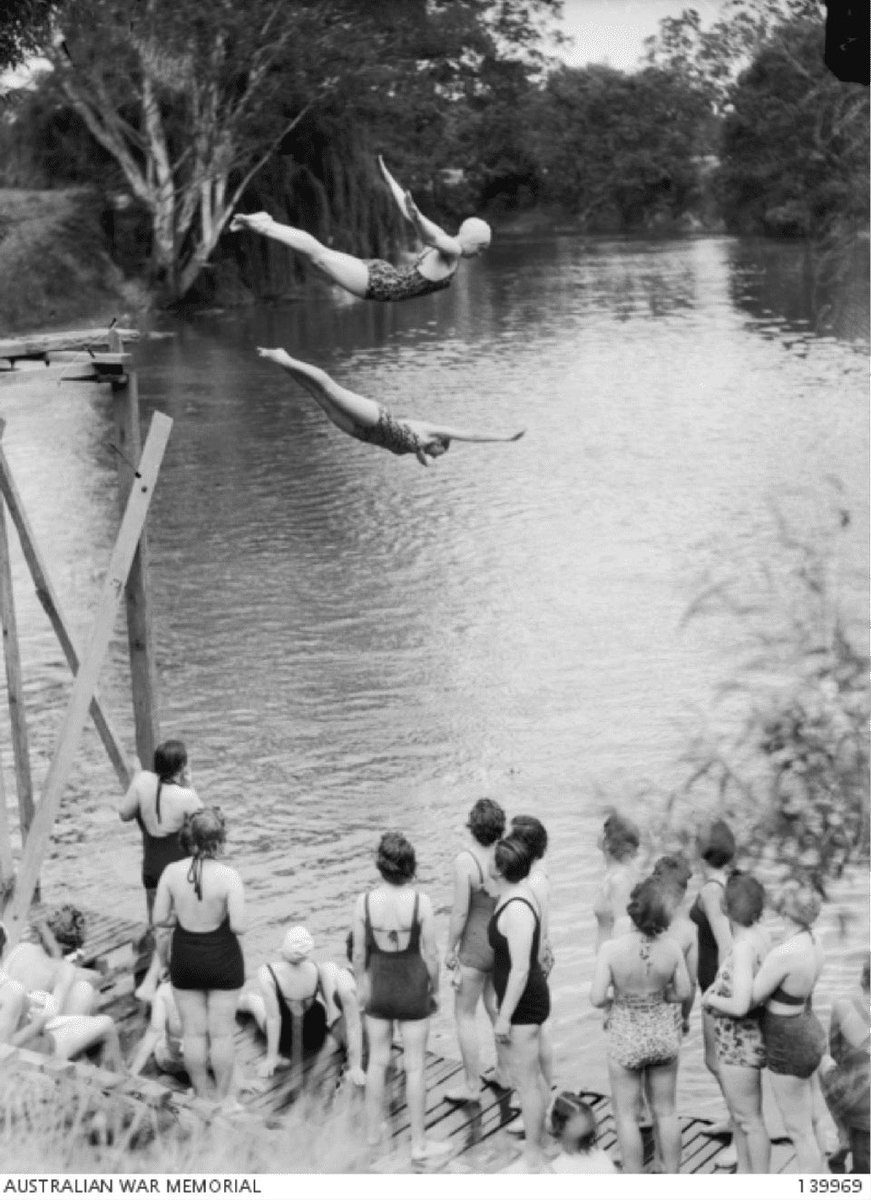 DivingQLD's tweet image. Throw back Thursday and how amazing is this photo of Lieutenant A. M. Dennis and sergeant D. Lawson, members of the Australian Women’s Army Service (AWAS), diving in the Yarra River in Melbourne 1943-11-17. #divingqld #divinglife #throwbackthursday