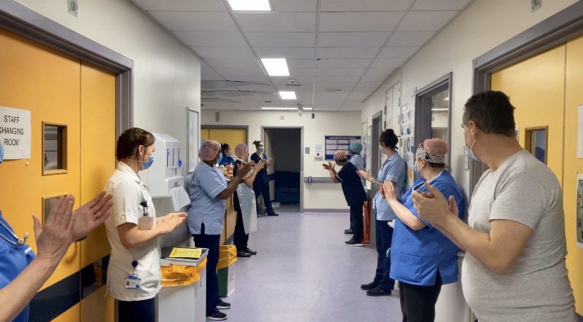 Clapping a recovered patient on their journey home. All our staff including SERCO, Therapy , Dr’s and Nursing staff ready to wish them well.  A positive journey from ITU to home. <a href="/GWH_NHS/">Great Western Hospitals NHS Foundation Trust</a>  #StayHomeSaveLives #teamwoody