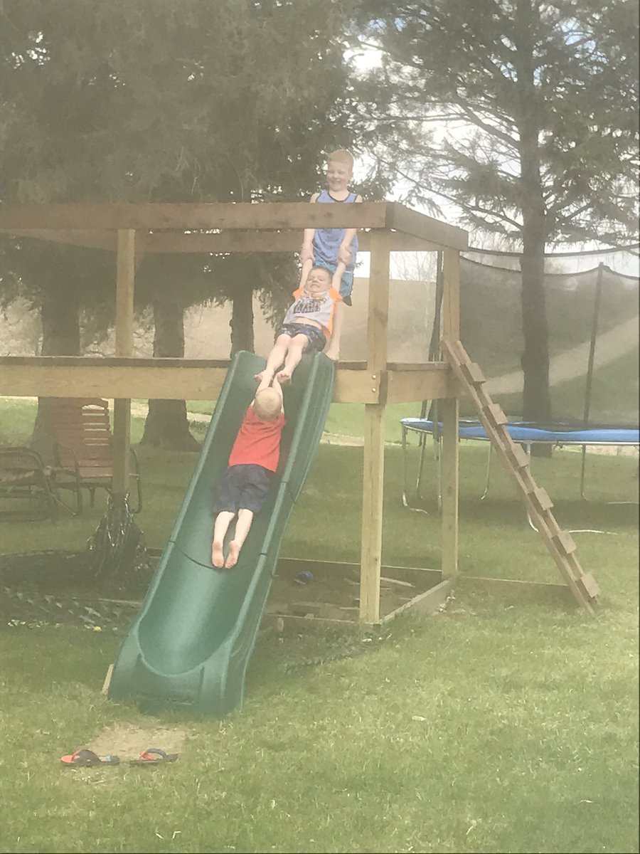 Home learning today. Student driven teamwork and problem solving. How do we get littlest brother up the slide? Never a dull moment