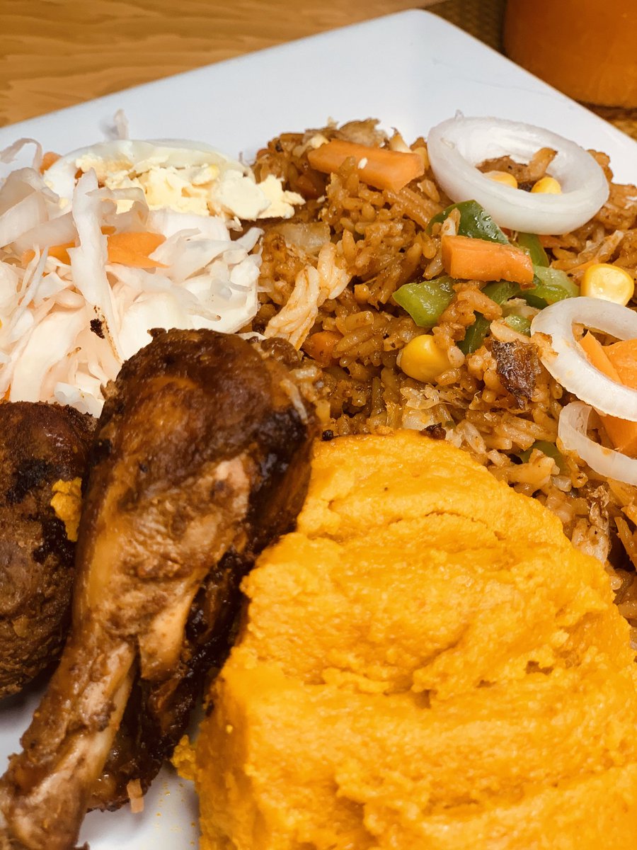 Day 3: Jollof rice, moimoi, chicken, coleslaw salad with an orange-carrot drink 