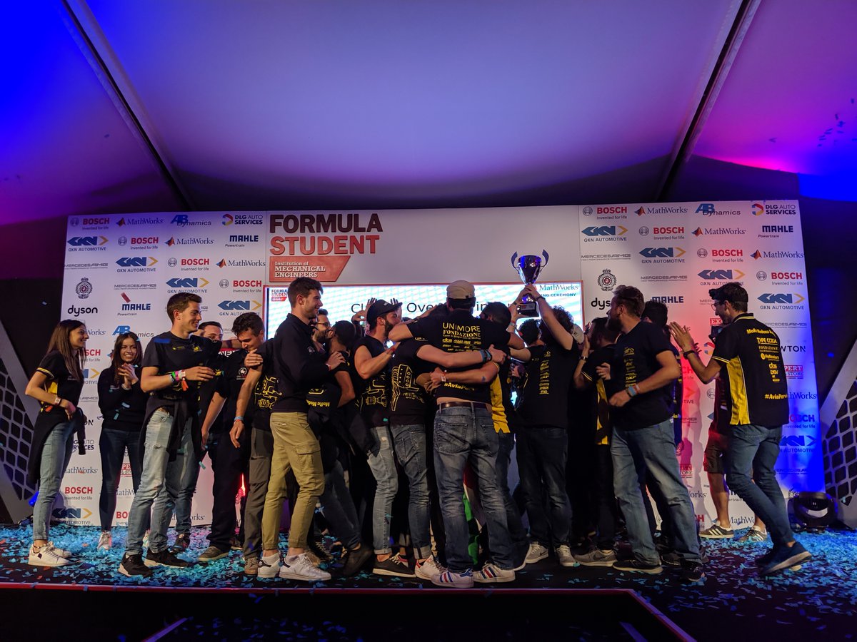 FormulaStudent's tweet photo. Today's #throwbackthursday is all about our current champions @Formula_MMR  who also came away with the lion's share of the Dynamic event trophies as well. Here's a celebration of the team and the bright yellow car that drove these Ingenious Italians to victory in 2019! https://t.co/J1fgoMreZz