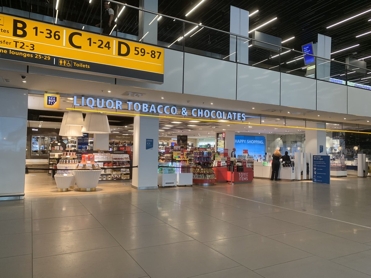 Much to my surprise nearly all of the shops are open in Schiphol — I can even buy tulips if I want to 