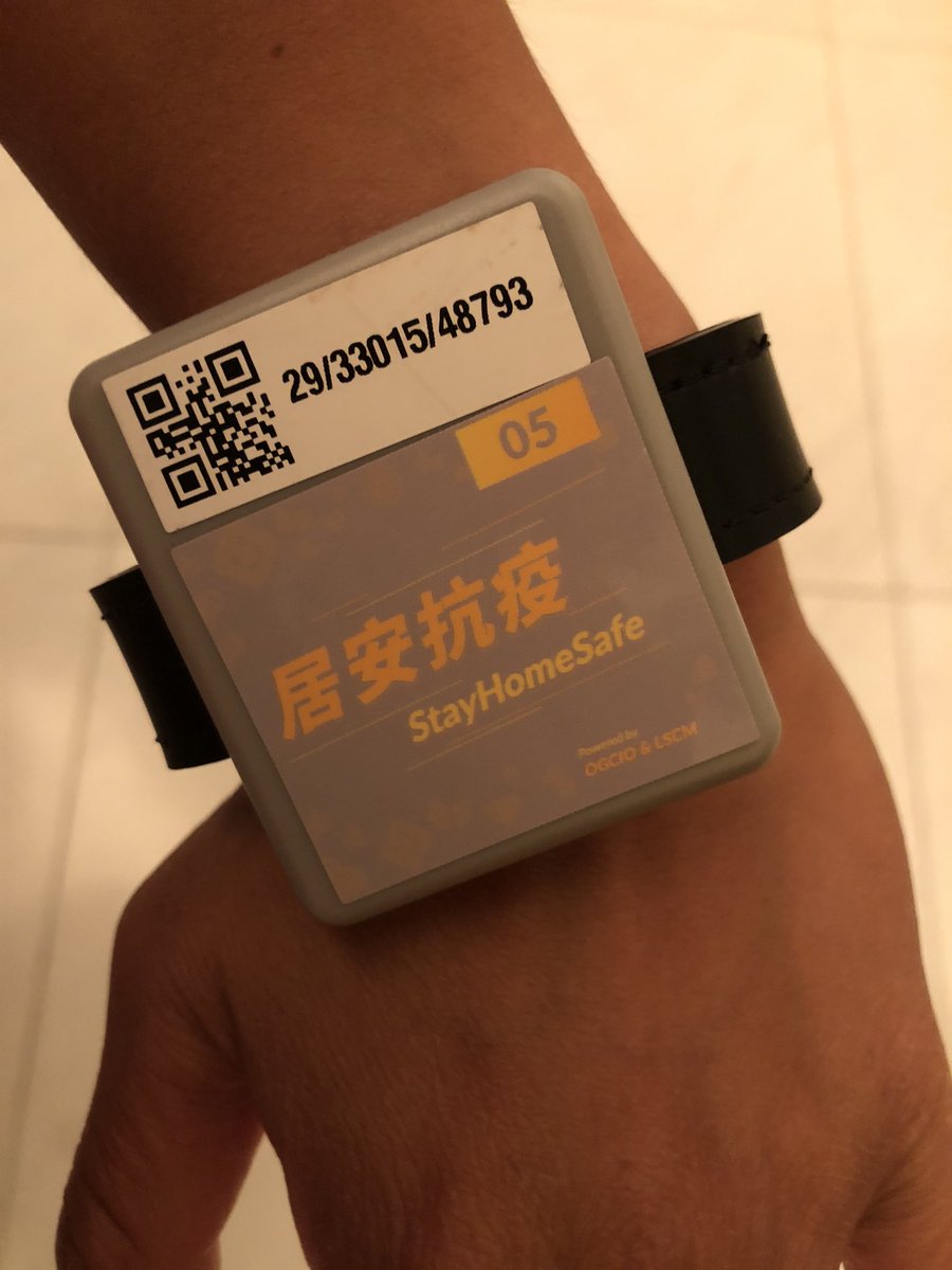 At the airport, staff made sure I scanned a QR code and downloaded the app, which was then registered to my phone # and my tracking bracelet. I had to let the app know when I got home from the airport.
