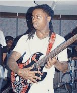 new hobby is editing photos of lil wayne playing guitar to make it look like it’s a film photo from a basement show