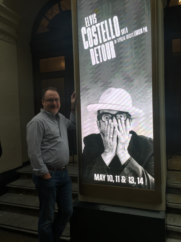jsamuel's tweet photo. @RobertWilonsky Just heard your music bit on the Ticket.  That was great.  

I’ve been an Elvis Costello fan since I first heard him in college in ’82.  My favorite gift my wife ever gave me was a trip to London to see him at the Palladium (his first time to play there).

Anyway, thanks. https://t.co/tfZH5PnNEV