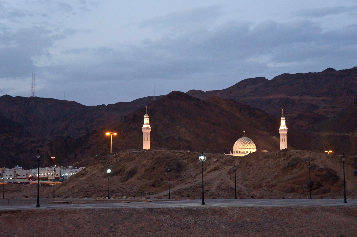 In the background in this picture is the Mount Uhud - the site for the second battle fought by the Muslims in 625 CE. This battle was preceded by the battle of Badr (624 CE) and followed by that of the Trench (672 CE).