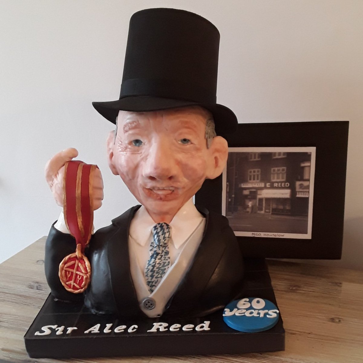 ReedPartnership's tweet photo. Last week, we held a company-wide baking competition, to celebrate REED Group's 60th birthday!
We are delighted to announce the winner: well done to Julia Eastwood for this depiction in cake of Sir Alec receiving his Knighthood!
#Reedat60 #improvinglivesthroughwork #LifeAtReed https://t.co/EJzpIaGn9x