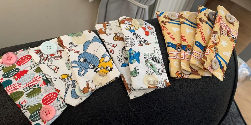 durham_uni's tweet photo. Well done to Natasha, an admin assistant at Josephine Butler College, for turning her spare material and buttons into ear savers for #keyworkers wearing #facemasks 👉 https://t.co/RDAkZqC1z5 @DUCollStuExp #COVID19 https://t.co/eE7wciFoI7