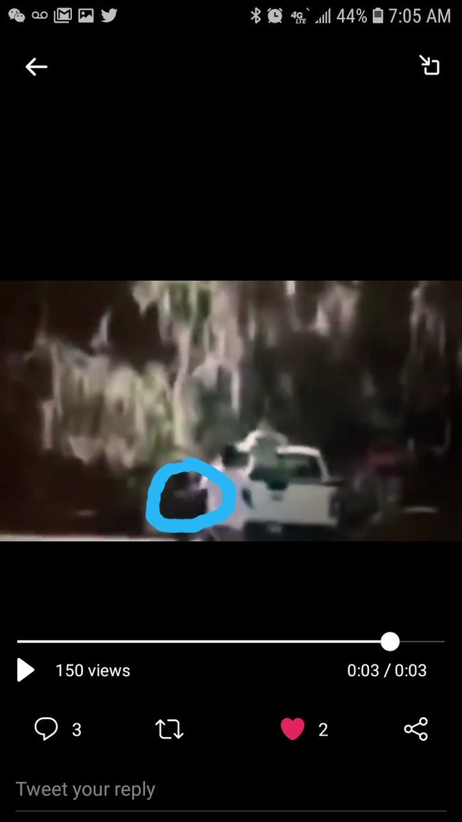 Frame  #1. Left arm extended, light colored object, about a foot long, in a horizontal position. Frame  #2. Light colored object in a vertical position. Position changed because he& #39;s moving his arm up.