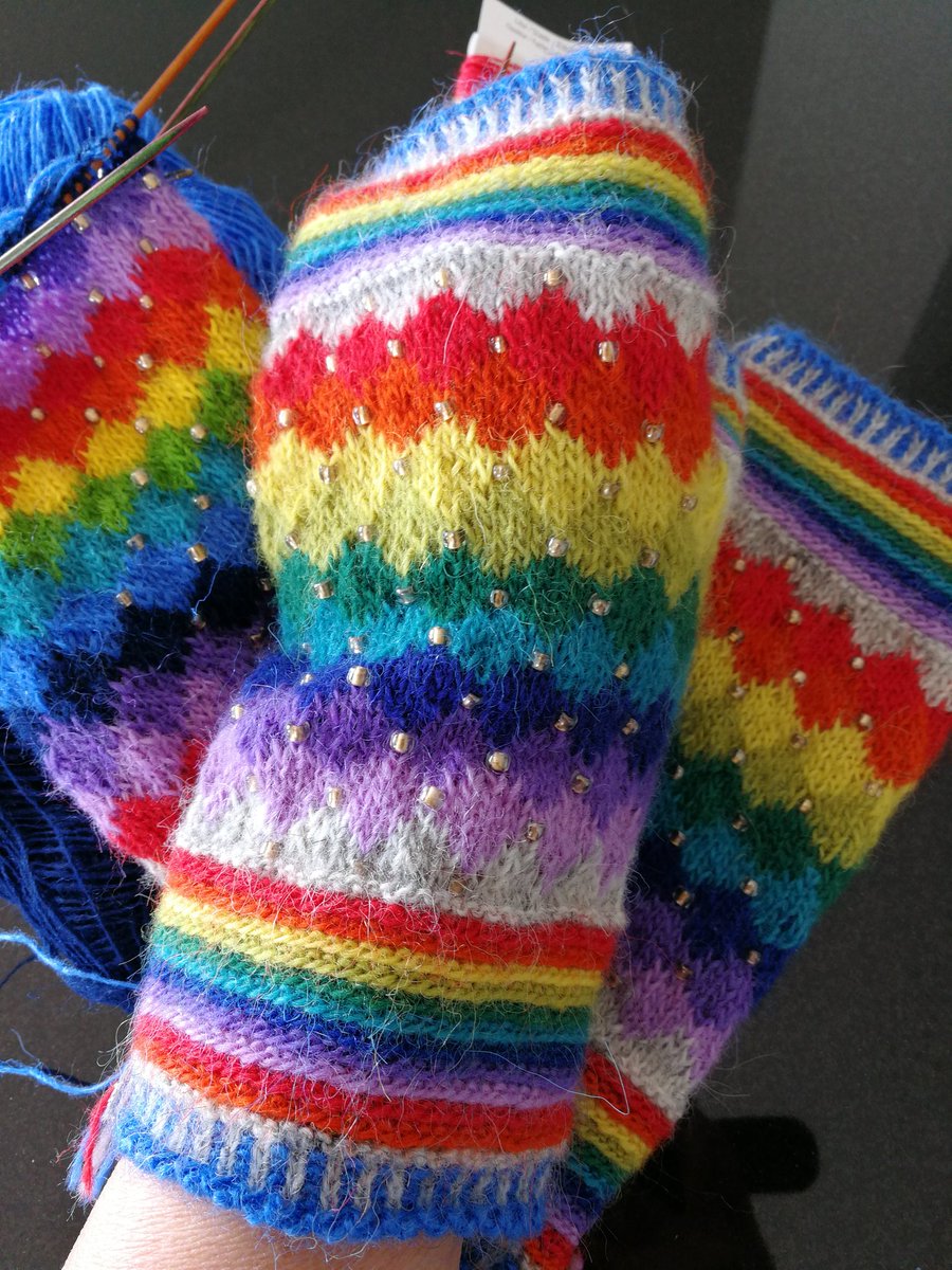 siouxian's tweet photo. @UKHKA Final version of beaded braided #rainbow mitts ready to wear. Well on the way to designing and working a longer version without braids. #handmade #einband #knitting #knittinginlockdown https://t.co/D2ii6RPNJx
