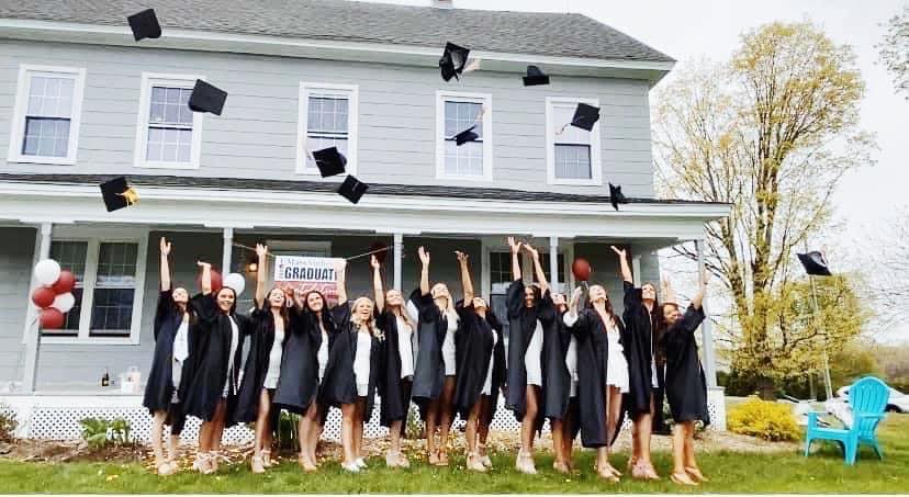 UMassAmherst's tweet photo. These roommates, who have been quarantining together for months, decided to host their own commencement ceremony—complete with appropriate social distance measures and a parade from their proud families! https://t.co/6CIUqEG4SZ

[📸: Abby Connolly] #UMass2020 #UMassTogether https://t.co/iCvXzIYzBt