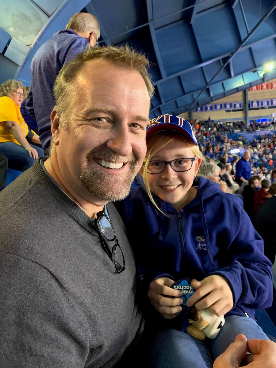KUCollege's tweet photo. 🎓 Jason Goff will graduate with a bachelor's of general studies in liberal arts and sciences. To share his love for the Jayhawks with his daughter, Lainie, the Goff family started a family tradition of attending basketball and football games in Lawrence each October. #KUgrads https://t.co/FlEji7Vw9h