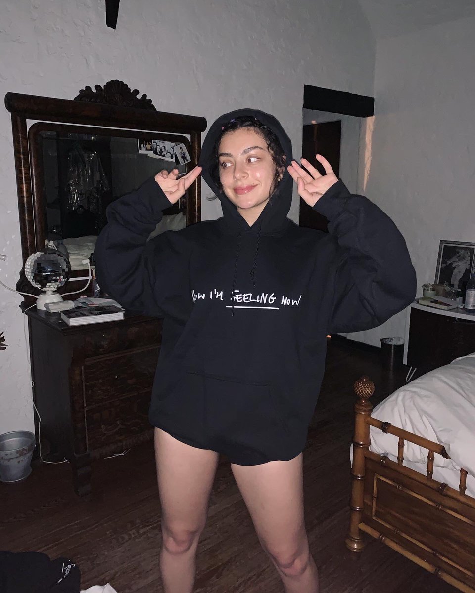 charli_xcx's tweet photo. 🖤 the #howimfeelingnow merch also comes in black for those of you who (like myself) can’t wear white without spilling something down it within 5 seconds 🖤 all profits generated are going to the amazing charity LA Alliance 🖤 merch drops Friday 🖤 https://t.co/R0bNOQJItG