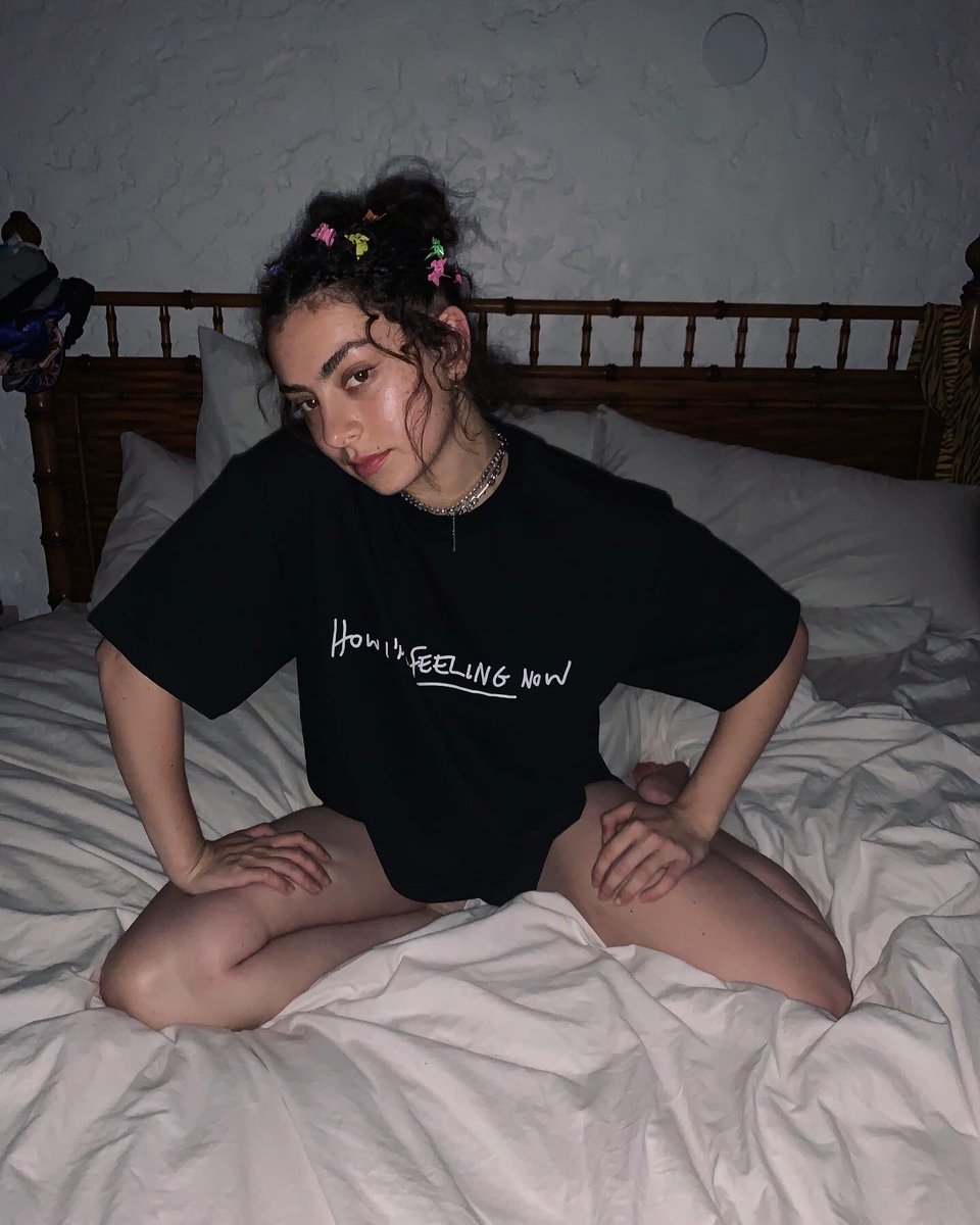 charli_xcx's tweet photo. 🖤 the #howimfeelingnow merch also comes in black for those of you who (like myself) can’t wear white without spilling something down it within 5 seconds 🖤 all profits generated are going to the amazing charity LA Alliance 🖤 merch drops Friday 🖤 https://t.co/R0bNOQJItG
