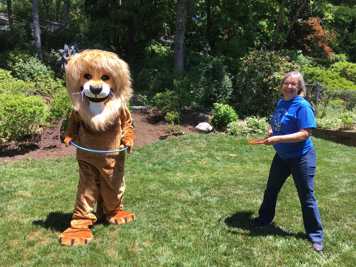 LacyESLions's tweet photo. The Lacy Lion is no longer “out of the loop” he is having a “wheelie” good time with Principal Miller. #lacylionmissingstudents @SherriMiller06 @JelynnC @LacyESLions @CentralWCPSS https://t.co/YVJypcrbmw