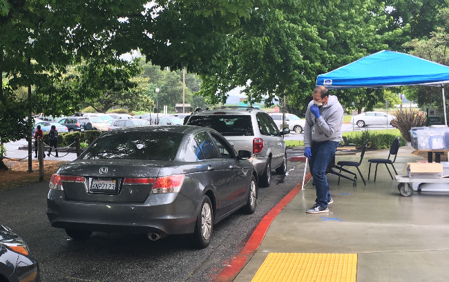 Rain or shine, PVUSD Tech Team continue their drive through support of student technical needs. Either a quick fix, or we swap the chromebook and get them back on the road to distance learning.  #oneteam #allineveryday <a href="/EdtechPVUSD/">PVUSD Edtech</a> <a href="/mlrod32/">Dr. Michelle Rodriguez</a> <a href="/LAguerriaLewis/">Lisa Aguerria Lewis</a> <a href="/PajaroValleyUSD/">Pajaro Valley Unified School District</a>