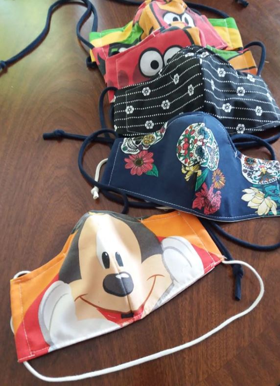 grace0051's tweet photo. I've made over 70 pleated masks for our local group. but also some fun ones as a birthday present @bigcommunitysew #bigcommunitysew https://t.co/JanzfA5ABu