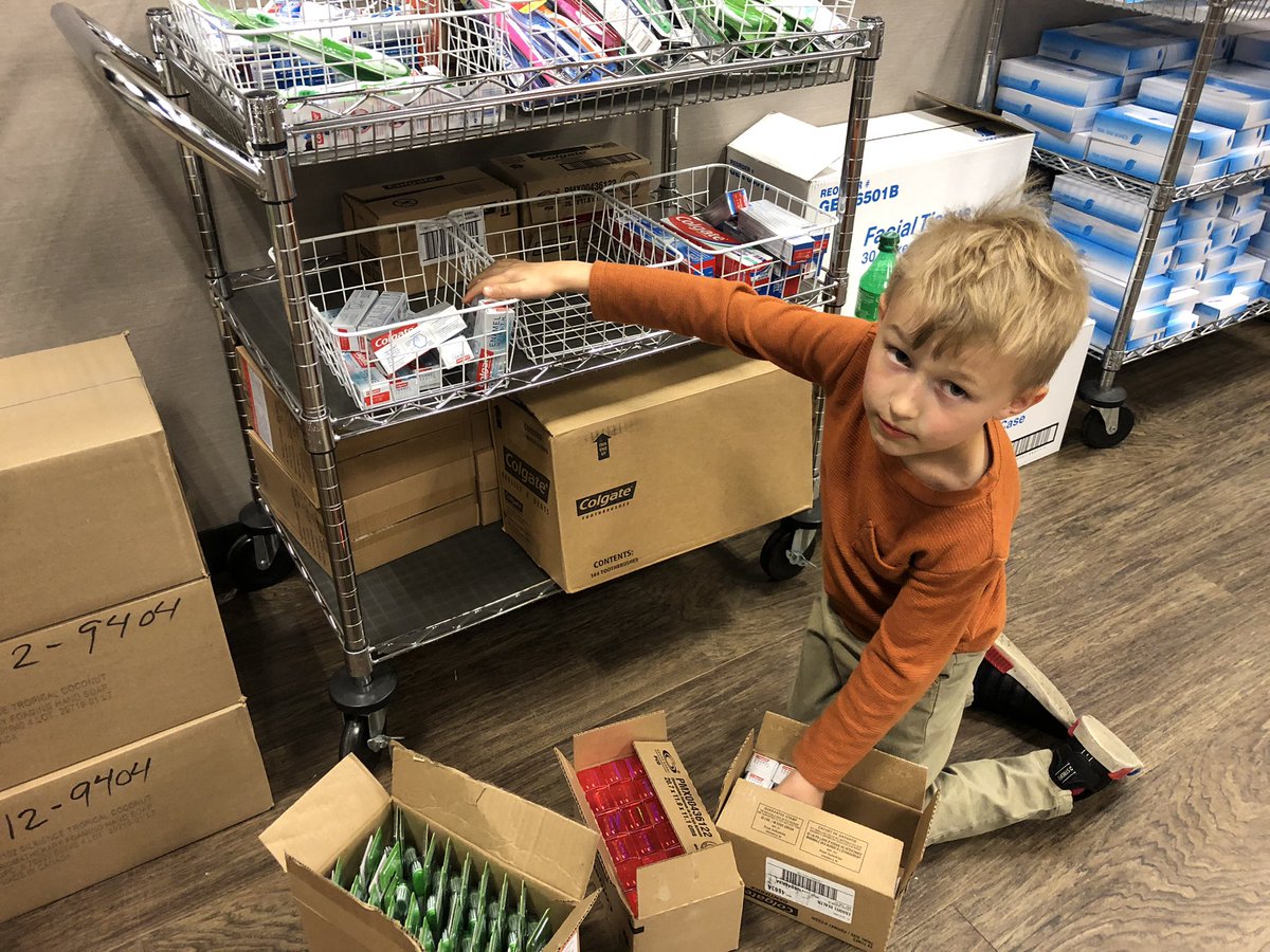 rpmlive's tweet photo. When Middle H is on point he will outwork most adults. He is on stocking duty today. Hopefully, we can keep him consistently on point as he grows older and serving our city. #CoronaHelpSF #KidsServe https://t.co/9IhJzPWHUD