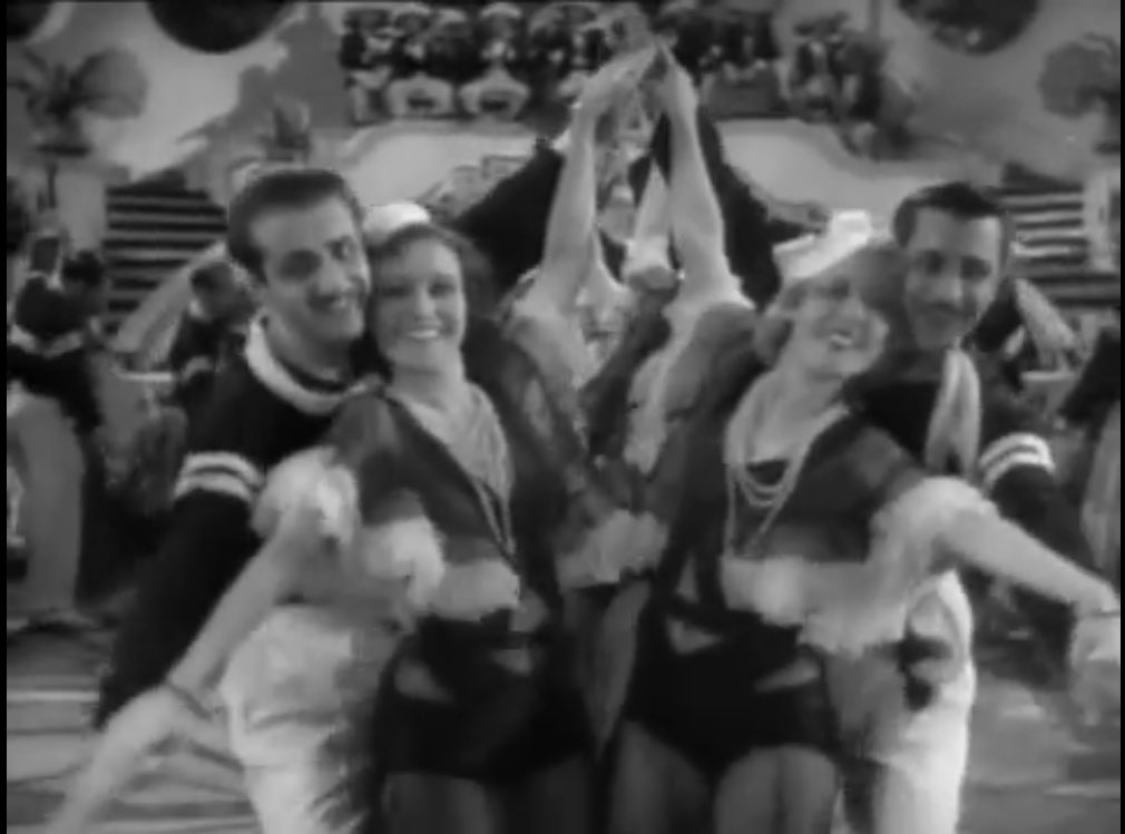 S’en suit juste après une version de troupe multi danseurs, avec froufrous et chorégraphie au cordeau, chantée par moments (premières paroles de la Carioca)Carioca (1933)