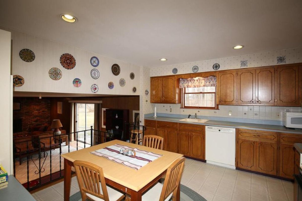 Kitchen before &amp; after! There are so many things to love about this space - the striking island, beautiful color coordination, &amp; better use of space are a few of our favorites! #cabinetdesignerskingston #kitchendesign #kitchenbeforeandafter #kitchengoals