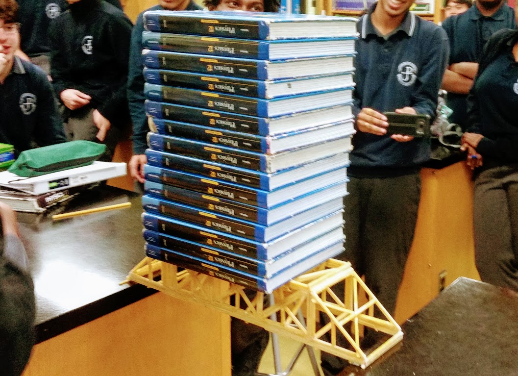 MrColautti's tweet photo. Incredible to witness history in the field of pasta bridge construction: this time 2 years ago, a record 21 textbooks were supported by a pasta-and-glue bridge. Due to COVID closure, the Gr.11 physics record stands untarnished for another year. #pastabridge #STEAM #physicsclass https://t.co/oqEX3ZVLS1