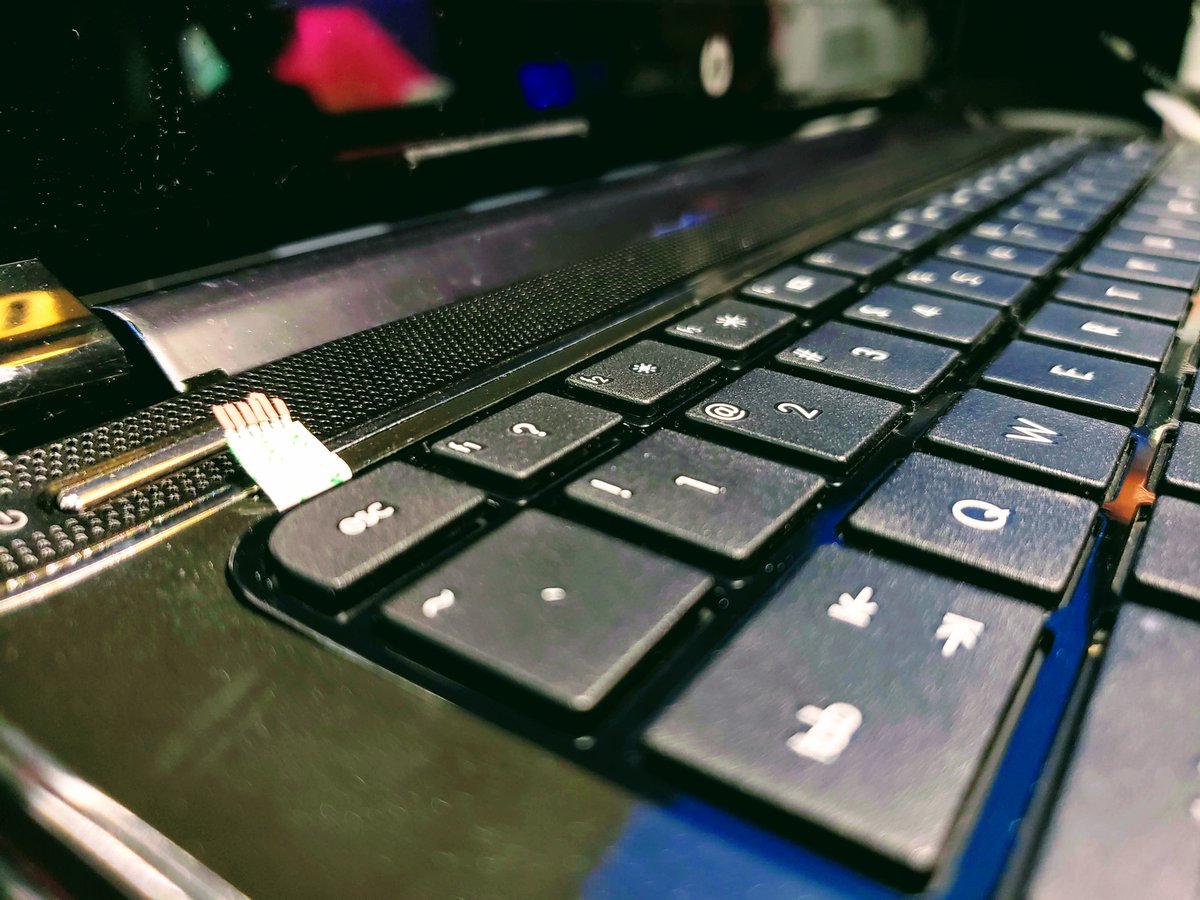 IFoundASteven's tweet photo. While upgrading the memory in my laptop, I broke the power button ribbon cable from its solder joints. Now I have the ribbon cable sticking out of the keyboard so I can power it on with a paper clip until I can order a new part. #doh #KeepItClassy https://t.co/DCvk4zZxzo
