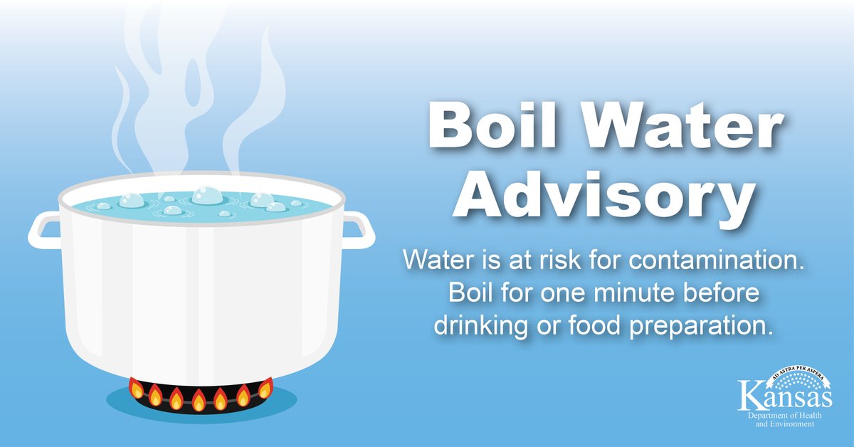 Pot of water boiling on the stove. Boil water advisory. Boil water for one minute before drinking or food preparation.