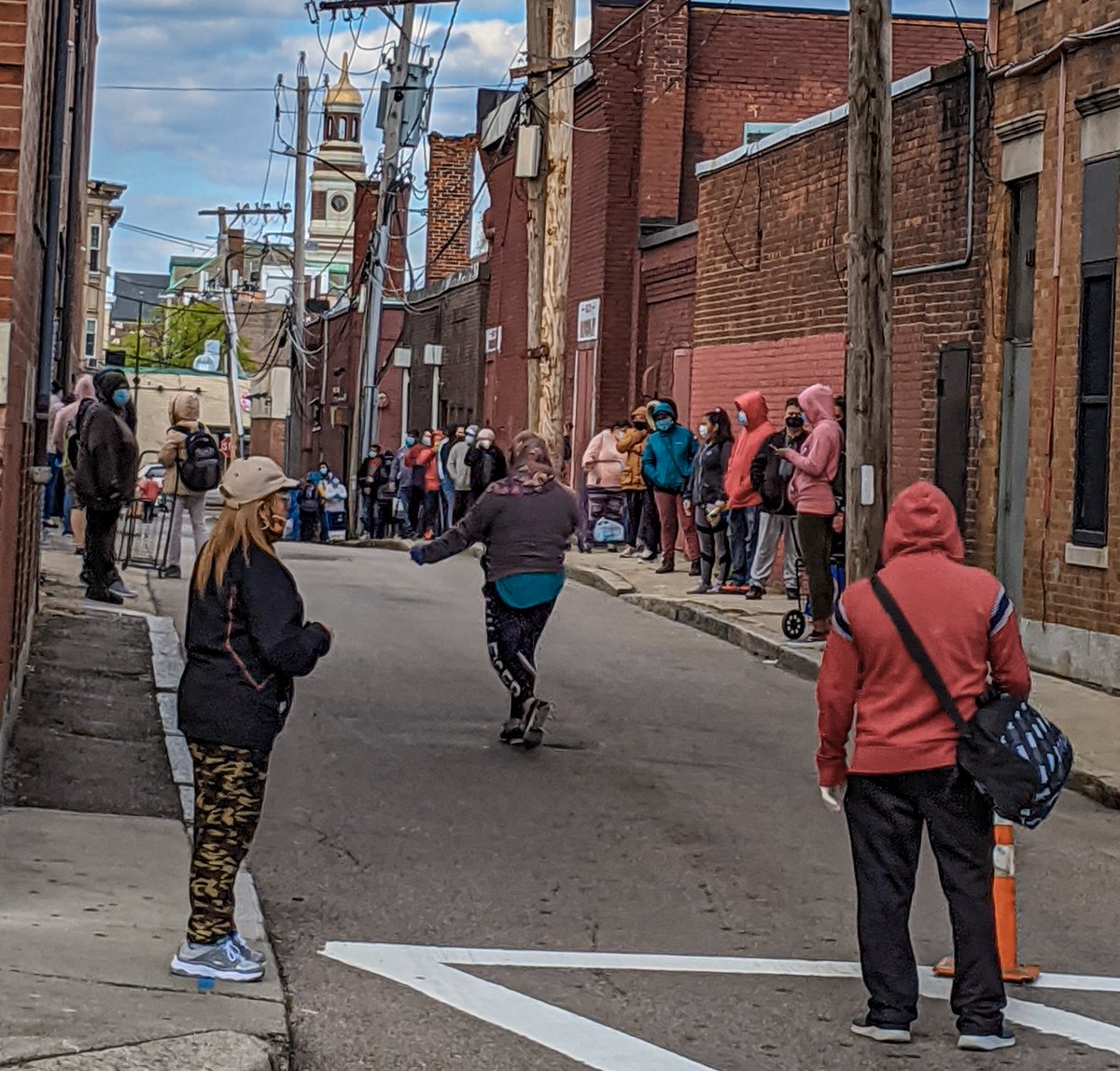 It's Tuesday in Chelsea , the socially distanced lines for the Tuesday Chelsea Collaborative pantry go around the side blocks and into a parking lot #chelseama @ChelseaCollab