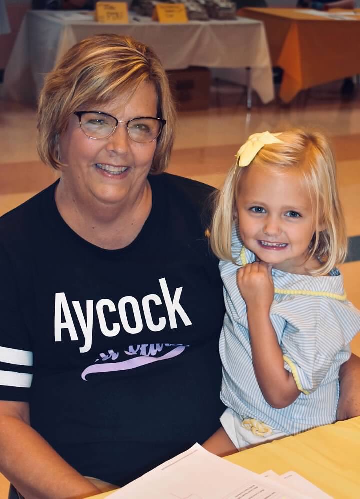 AYCOCKSCHOOL's tweet photo. Teacher Appreciation Spotlight! Teacher Asst., Mrs. Lynn Paschall, has such a kind &amp; loving heart! She always has a smile &amp; something positive to say! She cares! Every week since we’ve worked from home, she has reached out to her Kindergarten kids to check on them! That’s love! https://t.co/GS3u0DNo9m
