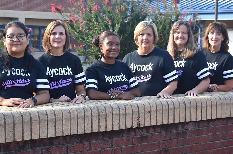 AYCOCKSCHOOL's tweet photo. Teacher Appreciation Spotlight! Teacher Asst., Mrs. Lynn Paschall, has such a kind &amp; loving heart! She always has a smile &amp; something positive to say! She cares! Every week since we’ve worked from home, she has reached out to her Kindergarten kids to check on them! That’s love! https://t.co/GS3u0DNo9m