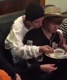 taehyung feeding a sleeping jungkook french fries when they were watching a dorama together