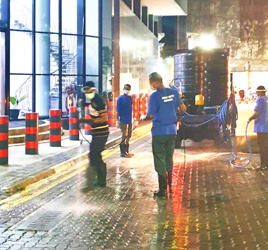 MaleCitymv's tweet photo. In our continuous efforts to combat #covid19 we are conducting disinfection of streets and public areas in Male’. Heres Day 2. 
We urge the public to #StayHome https://t.co/Vn1C8McUdt