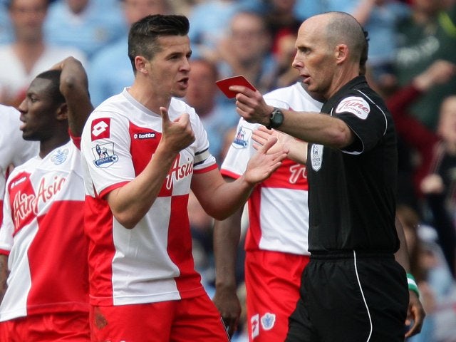 55' 1-1 Man City vs QPR - Joey Barton does what he does best with some aplomb.He was caught by the linesman to have elbowed Carlos Tevez in his face. Barton was rightly sent-off by Mike Dean.All City need to do now is score a goal against 10-man QPR in 35 minutes to win the PL