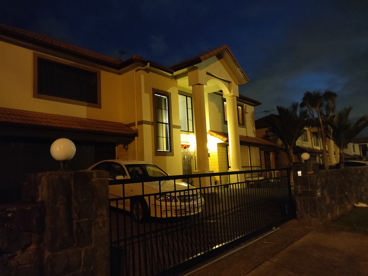 Today's theme is "hideous McMansions with godawful pillars"(I have made peace with being the bearded guy who takes photos of people's homes at night)