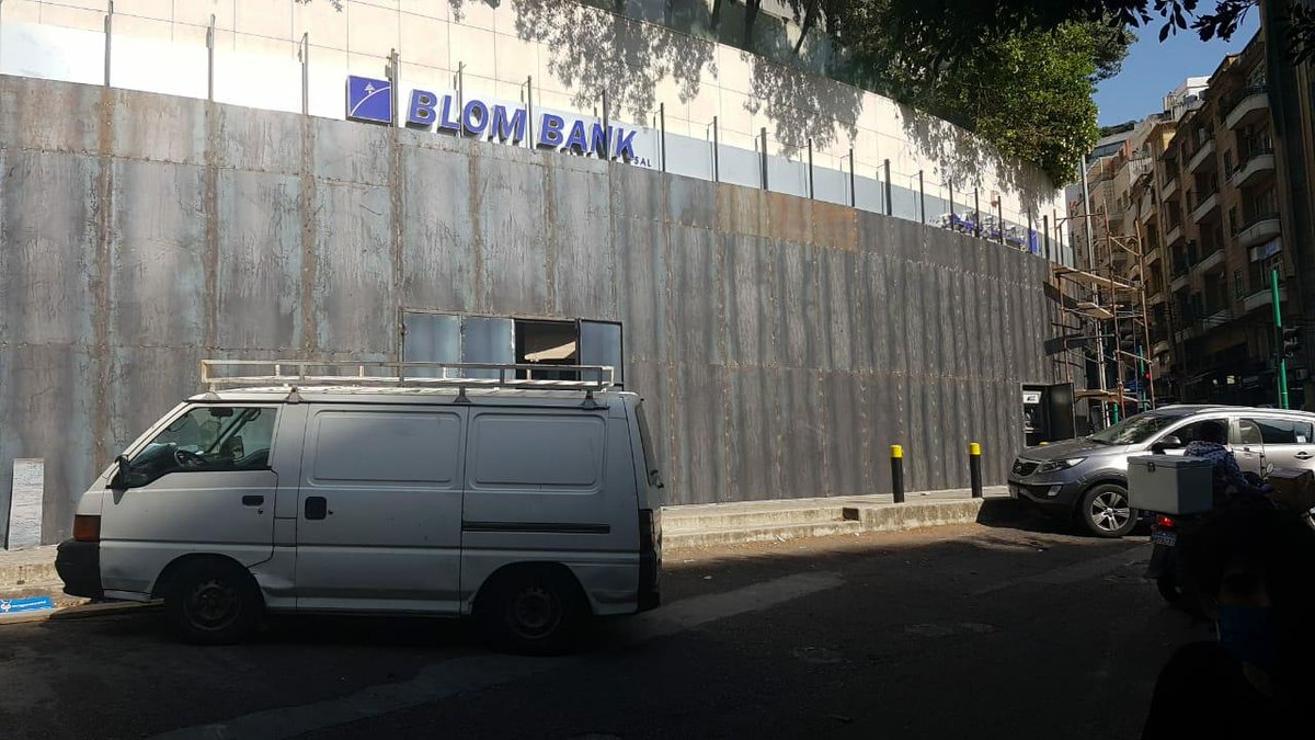 KarlreMarks's tweet photo. This bank in Lebanon asked to install a pay wall. Someone took the instruction literally. https://t.co/Nr9KN3Yiu6