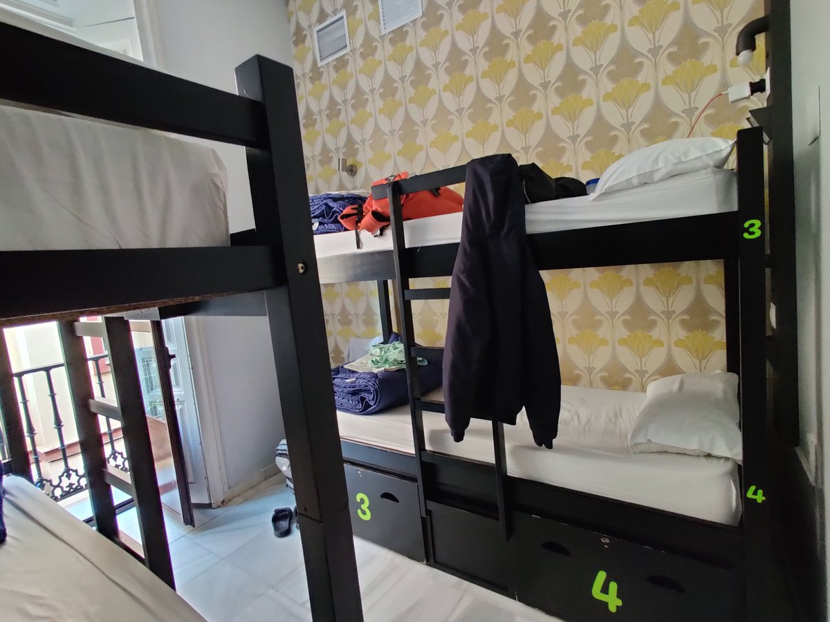 In Sevilla, i stayed in a hostel called Oasis Backpackers Palace. I booked it through an app called Hostel World.The room is a 4-bed dormitory with a private bathroom. And during that time, ada sorang American Korean old guy, siap offer wine lagi The price is 13€/night.