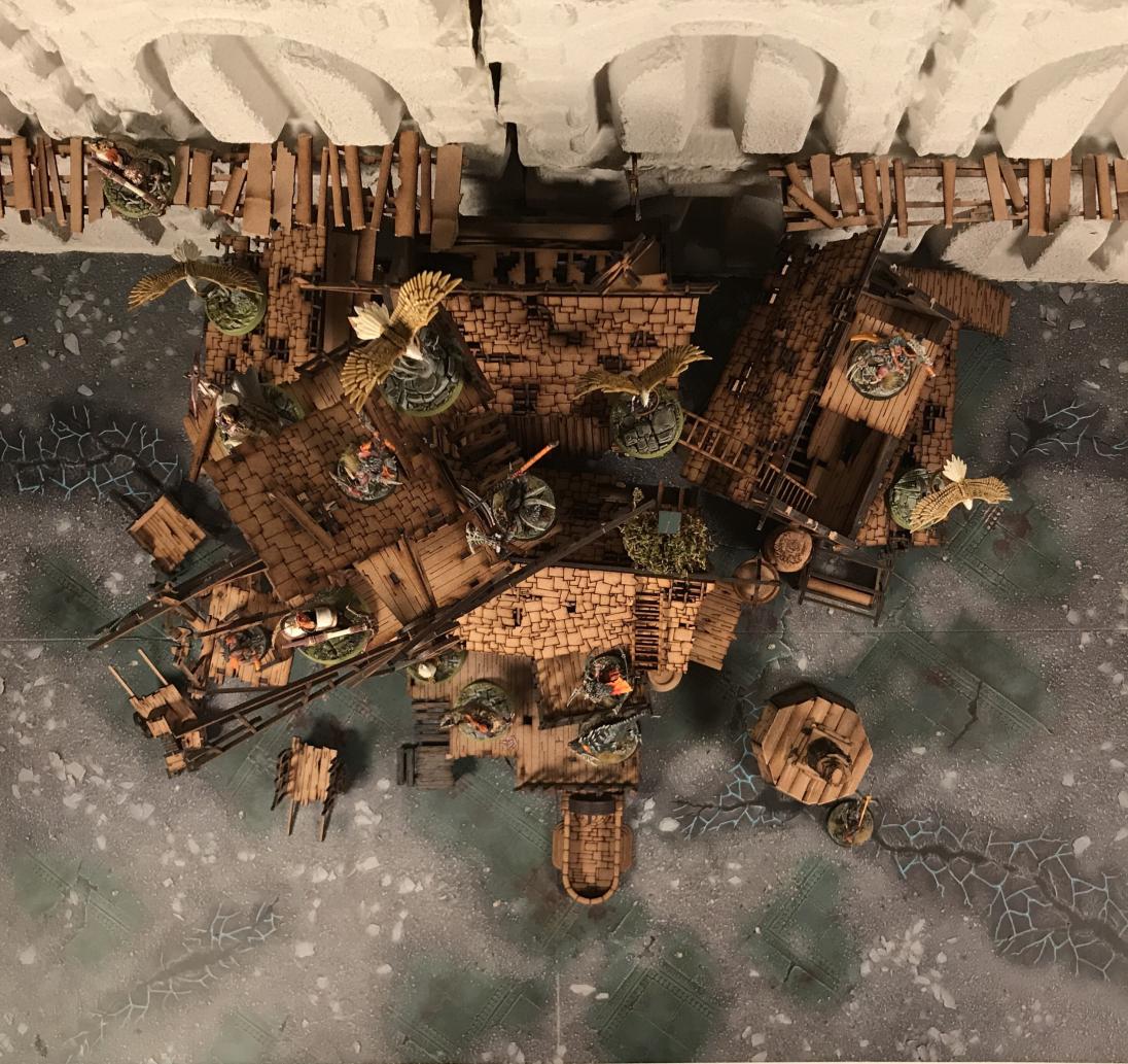 Shanty Town - by  @StoneMonkGamer - Built of MDF kits ( @warcradle) and scratch building the rest from left over scraps. Leaning against the outer wall of a City of Sigmar, this ramshackle outpost lives off the scraps coming out. Not finished, but ambitious   #CircleOfPaint